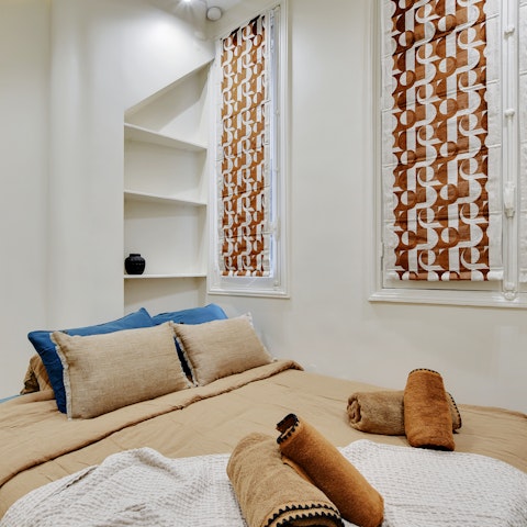 Sink into the comfortable bed after a day of Paris sightseeing