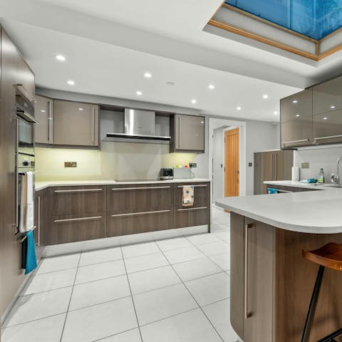 Rustle up a home-cooked meal in the sleek, modern kitchen