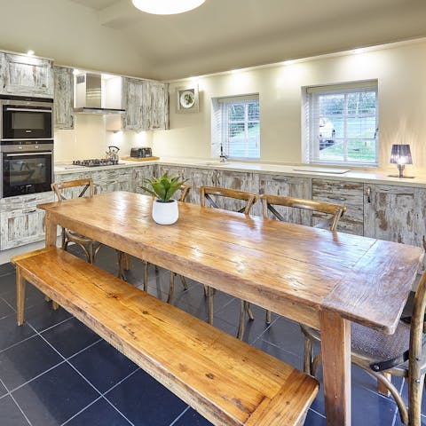 Enjoy family-style meals together in the chic farmhouse style kitchen