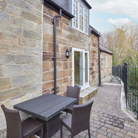 On sunny days relax with a book or enjoy breakfast at the patio table