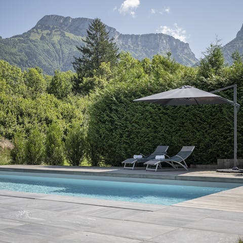 Enjoy incredible mountain views from the pool