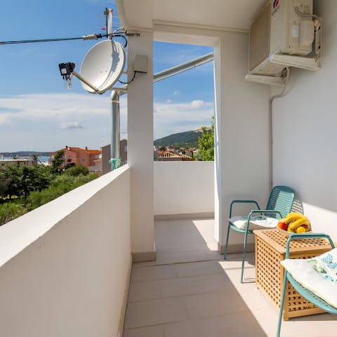 Unwind on your private balcony with the sea views