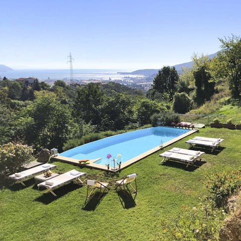 Enjoy a cooling swim in the private outdoor pool while you enjoy the peaceful woodland around you