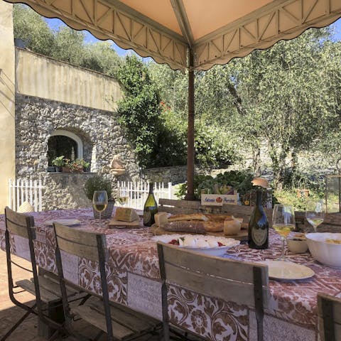 Sip on yummy Prosecco bellinis while you watch the sunset from the terrace dining area