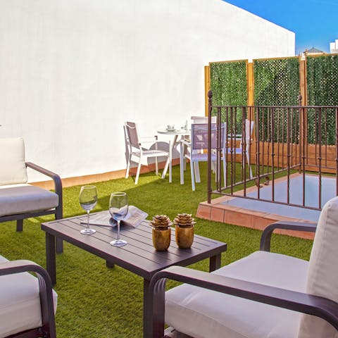 Enjoy a glass of wine up on the private terrace