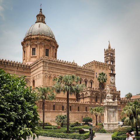 Admire the Art Nouveau architecture of Via della Libertà as you walk towards the cathedral
