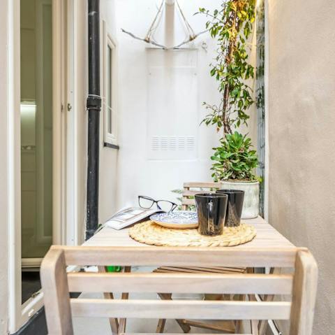 Sip your morning cappuccino in the petite outside space