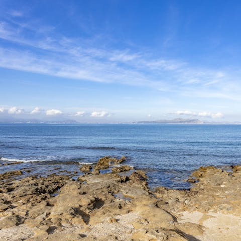 Swim, snorkel and kayak from the rocky shores, just 100m from your home