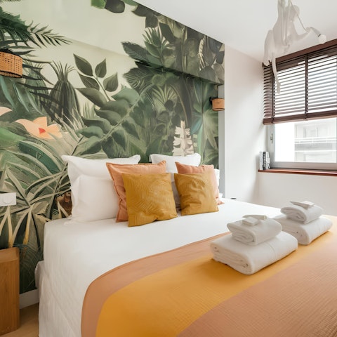 Embrace tropical touches throughout the apartment