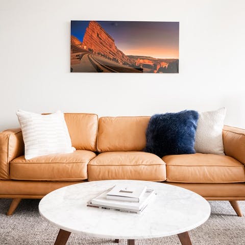 Kick back in the sunny living room with a freshly brewed cup of coffee and a good book