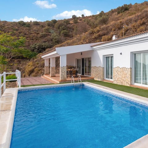 Swim out to the edge of the private swimming pool to enjoy the view surrounded by cool water
