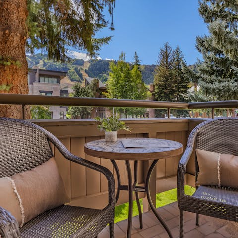 Take in the mountain view from the private balcony