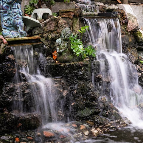 Listen to the soothing sound of the waterfall trickling