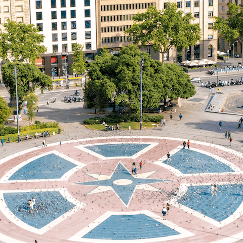Stroll around bustling Plaça de Catalunya, a nine-minute stroll from your door