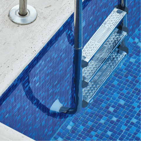 Spend afternoons taking dips in the communal pool