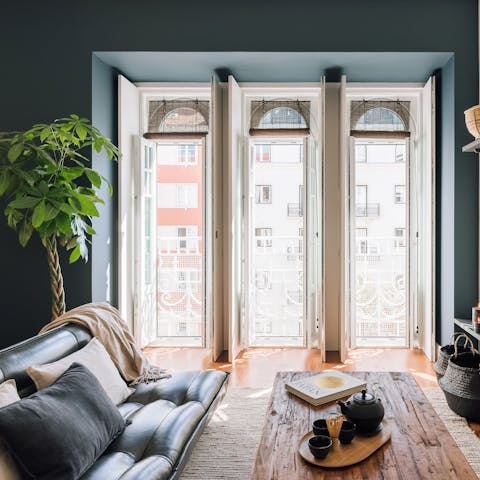 People-watch from your beautiful Juliet balconies, a glass of wine in hand