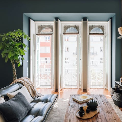 People-watch from your beautiful Juliet balconies, a glass of wine in hand