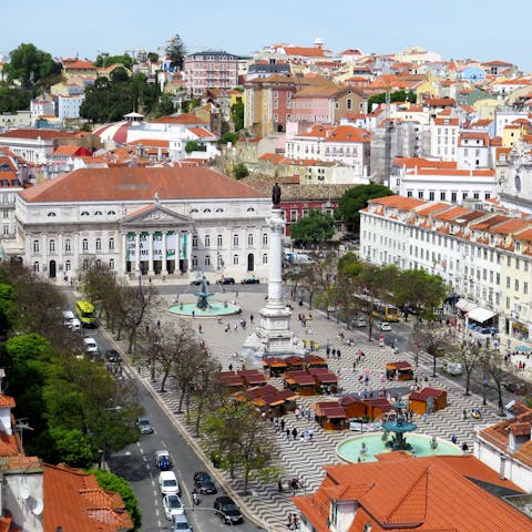 Visit bustling Rossio Square, a twenty-four-minute walk away