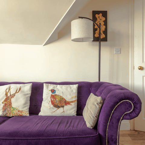 Put your feet up on the charming sofa