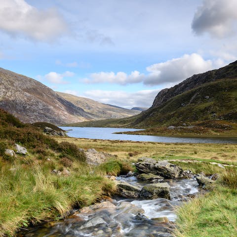 The majestic peaks of Snowdonia National Park are less than a thirty-minute drive away