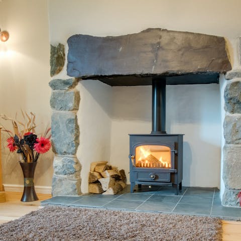 Light the fire for a touch of comfort in one of two cosy living rooms