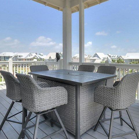 Relax and unwind with sunset drinks on the balcony