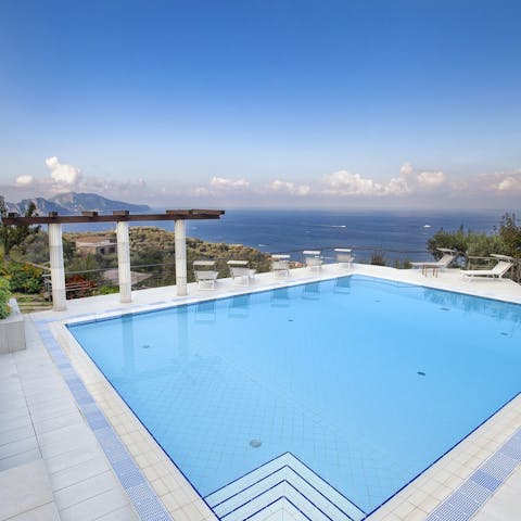 Admire the Capri, Gulf of Naples, and Vesuvius vistas from the private pool