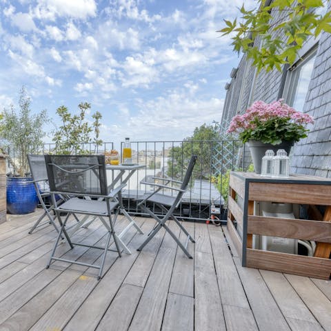 Sit out on the terrace and admire the views of Paris
