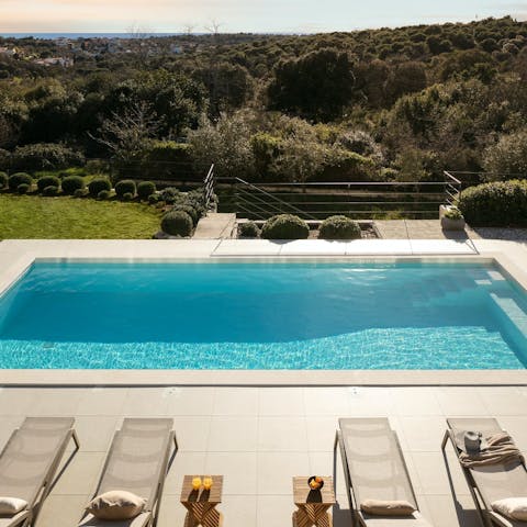 Spend days lazing by the pool, surrounded by nature