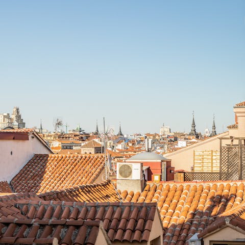 Marvel at the beautiful cityscape from your bedroom window