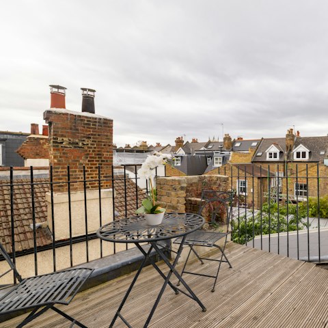 Sit on the roof terrace with a glass of wine