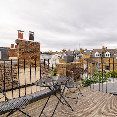 Sit on the roof terrace with a glass of wine
