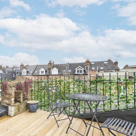 Sit on the roof terrace with a glass of wine