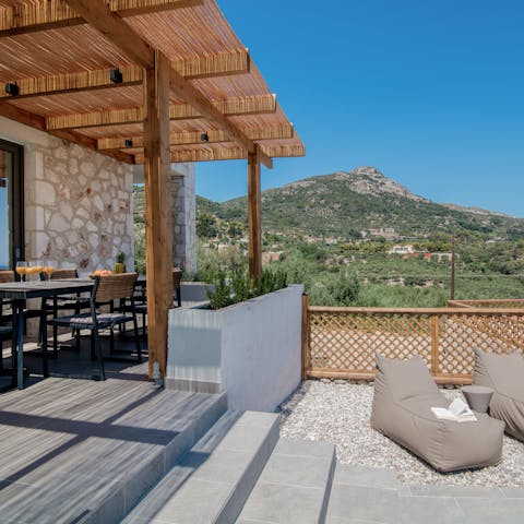 Take in the mountain views from the shaded dining terrace