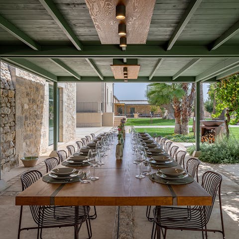 Dine alfresco on a professionally-prepared meal of pasta alla norma
