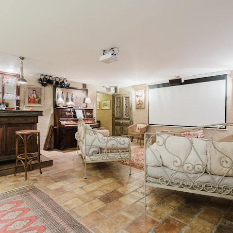 Gather the family for a movie night in the snug (complete with its own bar)
