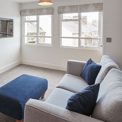 Snuggle up for a cosy evening of movies in the living room