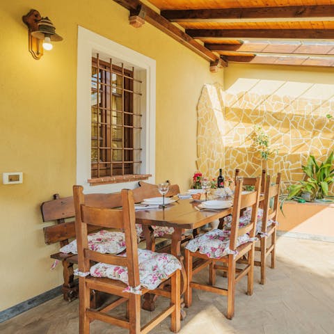 Tuck into tortelloni at the alfresco dining table