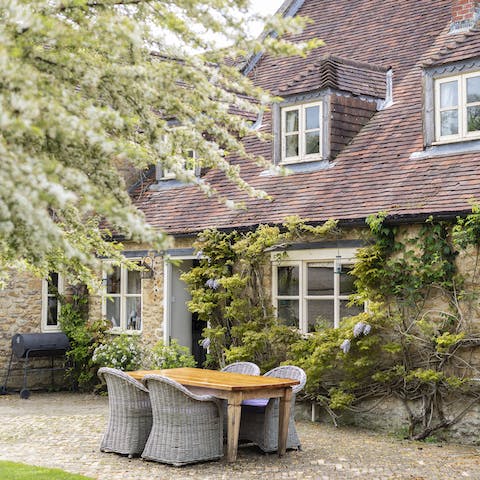 Gather for sundowners in the courtyard