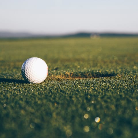 Grab your clubs and get on the green for some golf on the resort