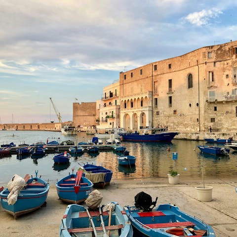 Explore the bustling coastal town of Monopoli, a twenty five-minute drive away