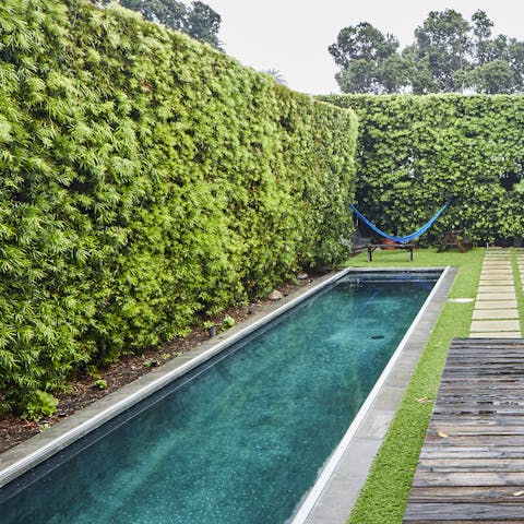Cool off in the saltwater lap pool before sunning yourself in the hammock