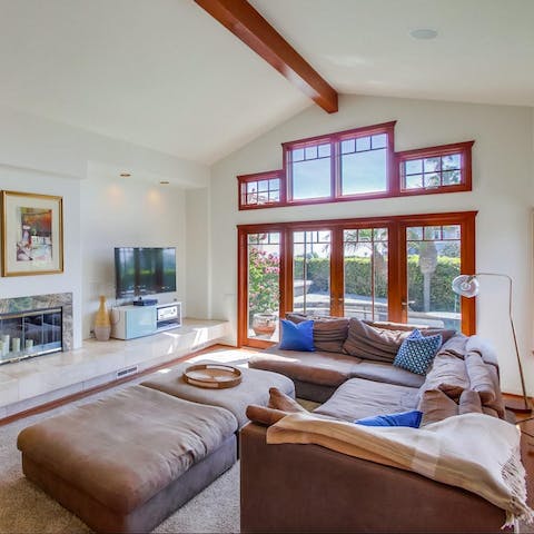 Curl up on the squashy sofa and enjoy a cosy evening in with your loved ones