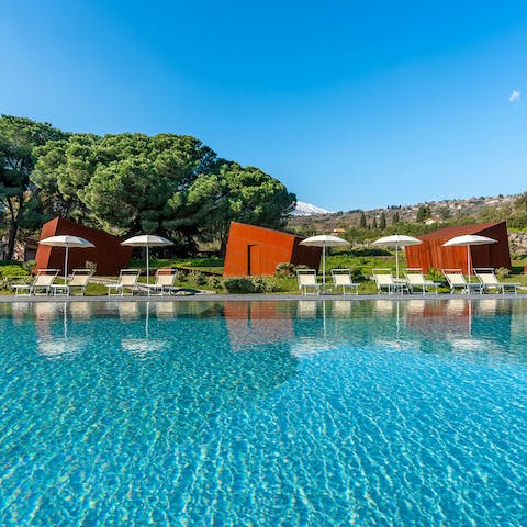 Take a refreshing dip in the pool or relax on the comfy sun loungers
