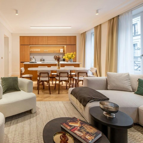 Relax with a glass of Champagne in the large living space