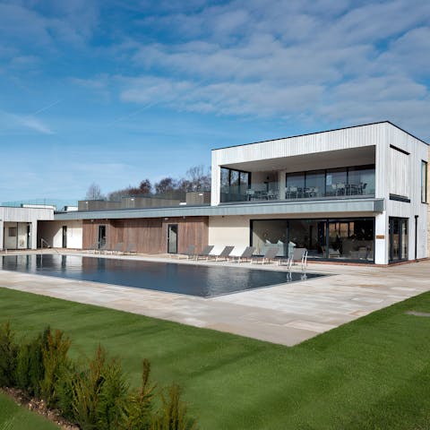 Soak up some sunshine by the communal outdoor pool