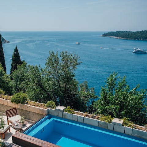 Watch the boats drift past Lokrum, floating out in the Adriatic