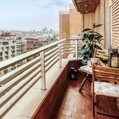 Kick back with a cocktail on the private balcony