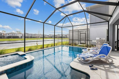 Cool off in the pool with waterside views stretching out beyond