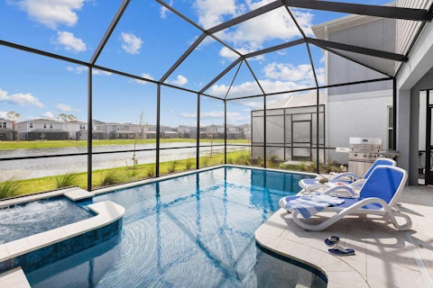 Cool off in the pool with waterside views stretching out beyond